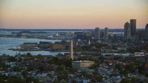 AX146_092.0000340F - Aerial stock photo of The Bunker Hill Monument at sunset in Charlestown, Massachusetts