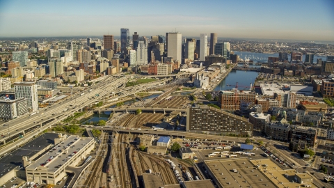 AX147_006.0000164 - Aerial stock photo of Industrial area near Downtown Boston skyscrapers, Fort Point Channel, Massachusetts