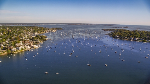 AX147_024.0000136 - Aerial stock photo of A coastal community and boats in Marblehead Harbor, Marblehead, Massachusetts
