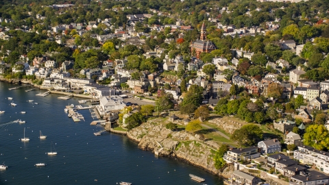 AX147_026.0000015 - Aerial stock photo of Coastal community and harbor in Marblehead, Massachusetts