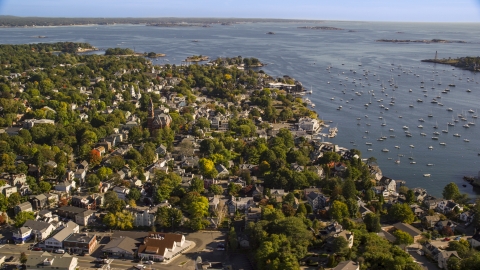 AX147_030.0000181 - Aerial stock photo of Abbott Hall and coastal community along harbor, Marblehead, Massachusetts