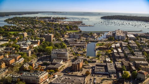 AX147_048.0000387 - Aerial stock photo of A coastal town beside a harbor, Salem, Massachusetts