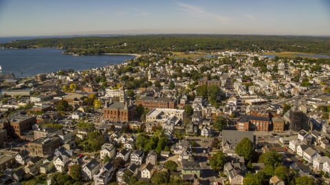 AX147_103.0000044 - Aerial stock photo of City hall in a coastal town, Gloucester, Massachusetts