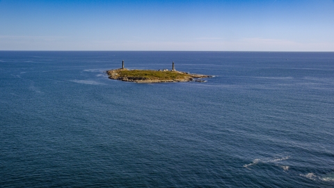 AX147_109.0000000 - Aerial stock photo of An island with two lighthouses, Thatcher Island, Massachusetts