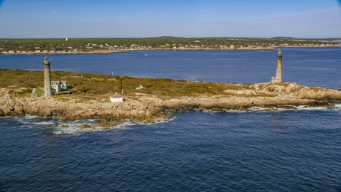 AX147_111.0000270 - Aerial stock photo of Two lighthouses on Thatcher Island, Massachusetts