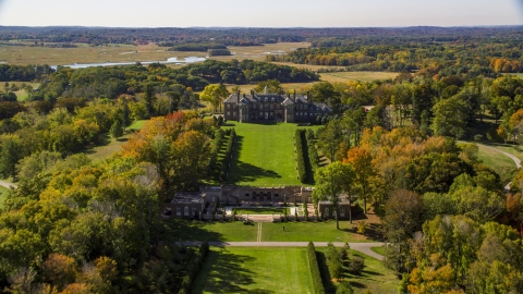 AX147_140.0000048 - Aerial stock photo of The Great House at Crane Estate on Castle Hill in autumn, Ipswich, Massachusetts