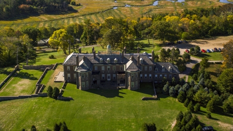 AX147_140.0000290 - Aerial stock photo of The Great House at Crane Estate on Castle Hill, autumn, Ipswich, Massachusetts