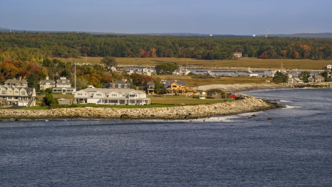 AX147_162.0000106 - Aerial stock photo of Oceanfront homes and new construction, autumn, Rye, New Hampshire
