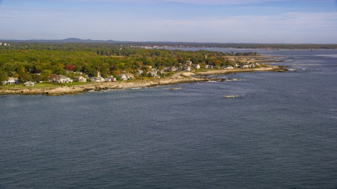 AX147_167.0000000 - Aerial stock photo of Beachfront homes in autumn seen from the ocean, Rye, New Hampshire