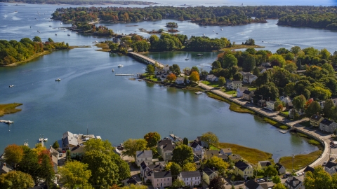AX147_186.0000000 - Aerial stock photo of A small bridge and waterfront homes in autumn, Portsmouth, New Hampshire