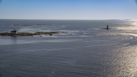 AX147_193.0000000 - Aerial stock photo of A lighthouse in the middle of the water, Kittery, Maine