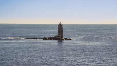 AX147_194.0000096 - Aerial stock photo of A lighthouse in the middle of the water, Kittery, Maine