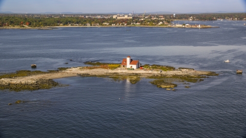AX147_197.0000000 - Aerial stock photo of An isolated home on an island, Kittery, Maine