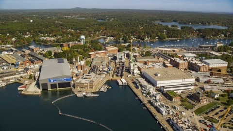 AX147_224.0000000 - Aerial stock photo of The Portsmouth Naval Shipyard in autumn, Kittery, Maine