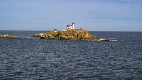AX147_236.0000165 - Aerial stock photo of Cape Neddick Light in York, Maine
