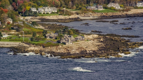 AX147_256.0000271 - Aerial stock photo of The Bush Compound by the rocky coastline in autumn, Kennebunkport, Maine