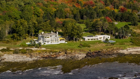 AX147_301.0000077 - Aerial stock photo of Oceanfront mansions, colorful autumn trees, Cape Elizabeth, Maine