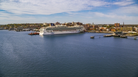 AX147_322.0000000 - Aerial stock photo of cruise ship docked at a pier, autumn, Portland, Maine