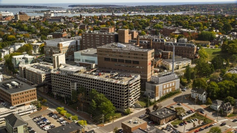AX147_356.0000000 - Aerial stock photo of The Maine Medical Center, autumn trees, Portland, Maine