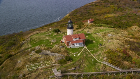 AX147_389.0000412 - Aerial stock photo of A view of the Seguin Light in autumn, Phippsburg, Maine