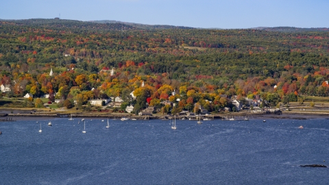 AX148_002.0000198 - Aerial stock photo of A small waterfront town in autumn, Wiscasset, Maine
