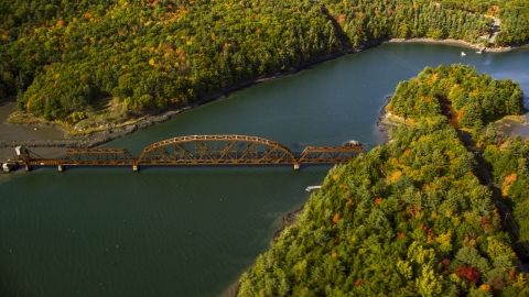 AX148_006.0000195 - Aerial stock photo of A bridge spanning Sheepscot River in autumn, Newcastle, Maine