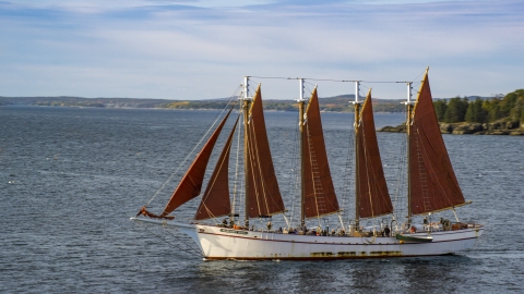 AX148_196.0000086 - Aerial stock photo of A sailing ship in Bar Harbor, Maine