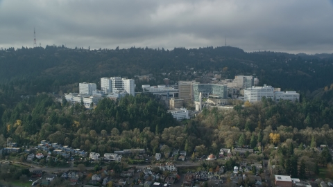 AX153_082.0000135F - Aerial stock photo of Oregon Health and Science University in the hills of Portland, Oregon
