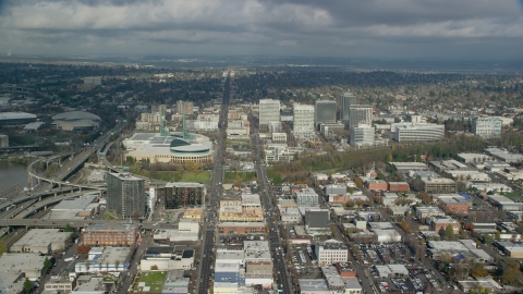 AX153_101.0000000F - Aerial stock photo of The Oregon Convention Center and a group of office buildings in Lloyd District, Portland, Oregon