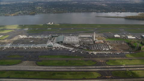 AX153_134.0000130F - Aerial stock photo of Approach Portland International Airport runways and terminals in Oregon