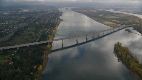 AX153_138.0000000F - Aerial stock photo of I-205 Bridge spanning Columbia River in Vancouver, Washington