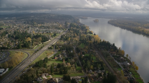 AX153_143.0000000F - Aerial stock photo of Suburban homes between Highway 14 and Columbia River, Vancouver, Washington