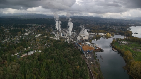 AX153_151.0000000F - Aerial stock photo of The Georgia Pacific Paper Mill in Camas, Washington