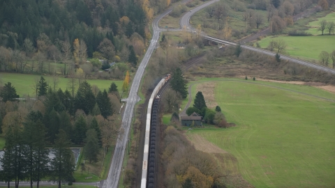 AX153_172.0000310F - Aerial stock photo of A train in Washougal, Washington
