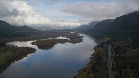 AX154_025.0000144F - Aerial stock photo of I-84 and islands in the Columbia River Gorge