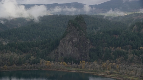 AX154_027.0000278F - Aerial stock photo of Beacon Rock in the Columbia River Gorge, Skamania County, Washington