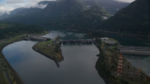 AX154_030.0000196F - Aerial stock photo of Bonneville Dam in the Columbia River Gorge