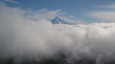 AX154_061.0000000F - Aerial stock photo of Clouds and the summit of Mount Hood, Cascade Range, Oregon