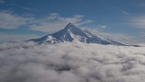 AX154_070.0000000F - Aerial stock photo of The summit of Mount Hood with snow and low clouds, Mount Hood, Cascade Range, Oregon