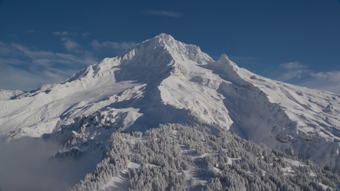 AX154_080.0000000F - Aerial stock photo of Snow-covered slopes of Mount Hood, Cascade Range, Oregon