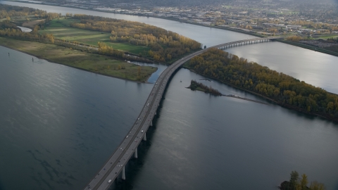 AX154_219.0000231F - Aerial stock photo of I-205 Bridge spanning the Columbia River, Vancouver, Washington