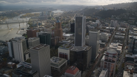 AX154_244.0000321F - Aerial stock photo of KOIN Center and Wells Fargo Center in Downtown Portland, Oregon