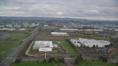 AX155_001.0000184F - Aerial stock photo of Jireh Semiconductor plant in Hillsboro, Oregon
