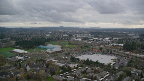 AX155_008.0000037F - Aerial stock photo of Shopping center and Tualatin Hills Sports Complex near Nike Headquarters, Beaverton, Oregon