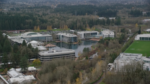 AX155_011.0000118F - Aerial stock photo of Nike Headquarters office buildings in Beaverton, Oregon