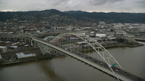 AX155_034.0000061F - Aerial stock photo of The Fremont Bridge in Downtown Portland, Oregon