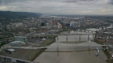 AX155_047.0000000F - Aerial stock photo of Willamette River and bridges near Downtown Portland, Oregon