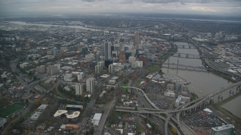 AX155_081.0000000F - Aerial stock photo of Downtown Portland cityscape and the Willamette River in Oregon