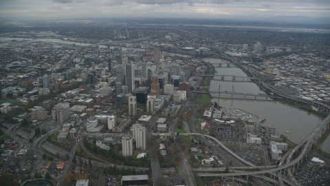 AX155_081.0000209F - Aerial stock photo of Downtown Portland cityscape and the Willamette River in Oregon