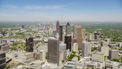AX36_004.0000076F - Aerial stock photo of Downtown skyscrapers and Westin Peachtree Plaza Hotel, Atlanta, Georgia